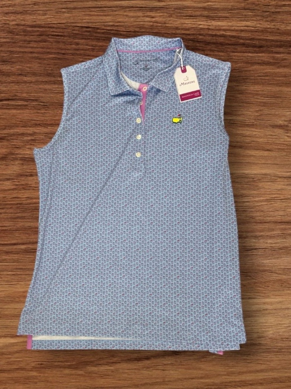 Magnolia Lane Tech Masters Women's Sleeveless Golf Polo
Blue Pink Print Size L